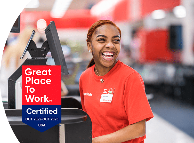 'Great Place to Work - Certified Oct 2022-Oct 2023' - Winn-Dixie cashier smiling