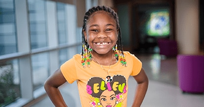 Smiling girl at a local children’s hospital.