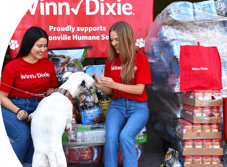 Winn-Dixie associates volunteering at a local animal welfare organization.