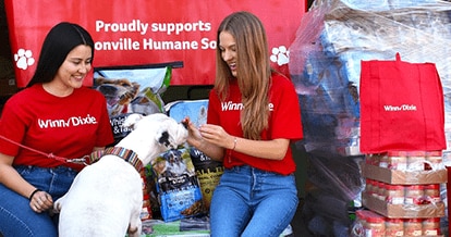 Winn-Dixie associates volunteering at a local animal welfare organization.
