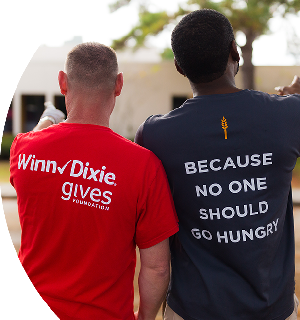 Volunteers standing side by side