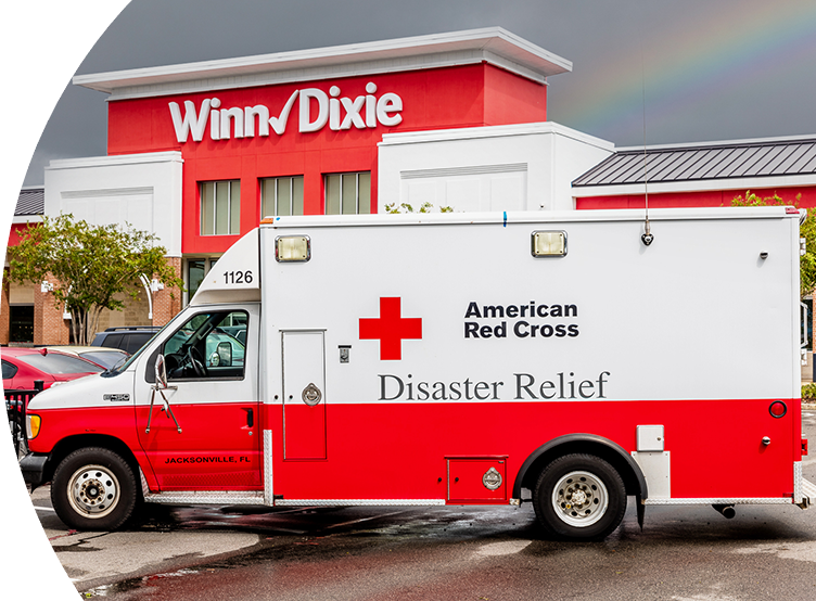 American Red Cross ambulance in front of a Winn-Dixie store
