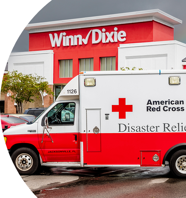 American Red Cross ambulance in front of a Winn-Dixie store