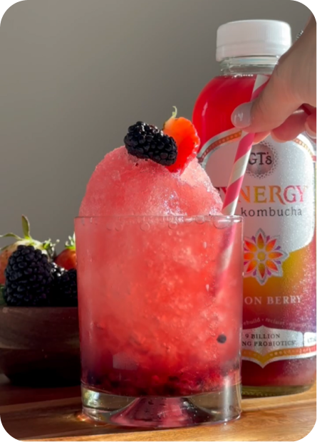 SYNERGY Raw Kombucha Lemon Berry Snow Cone served in a glass.