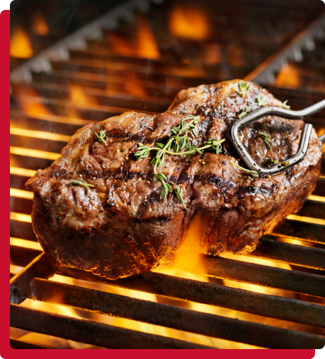 Steak marinade on a grill.